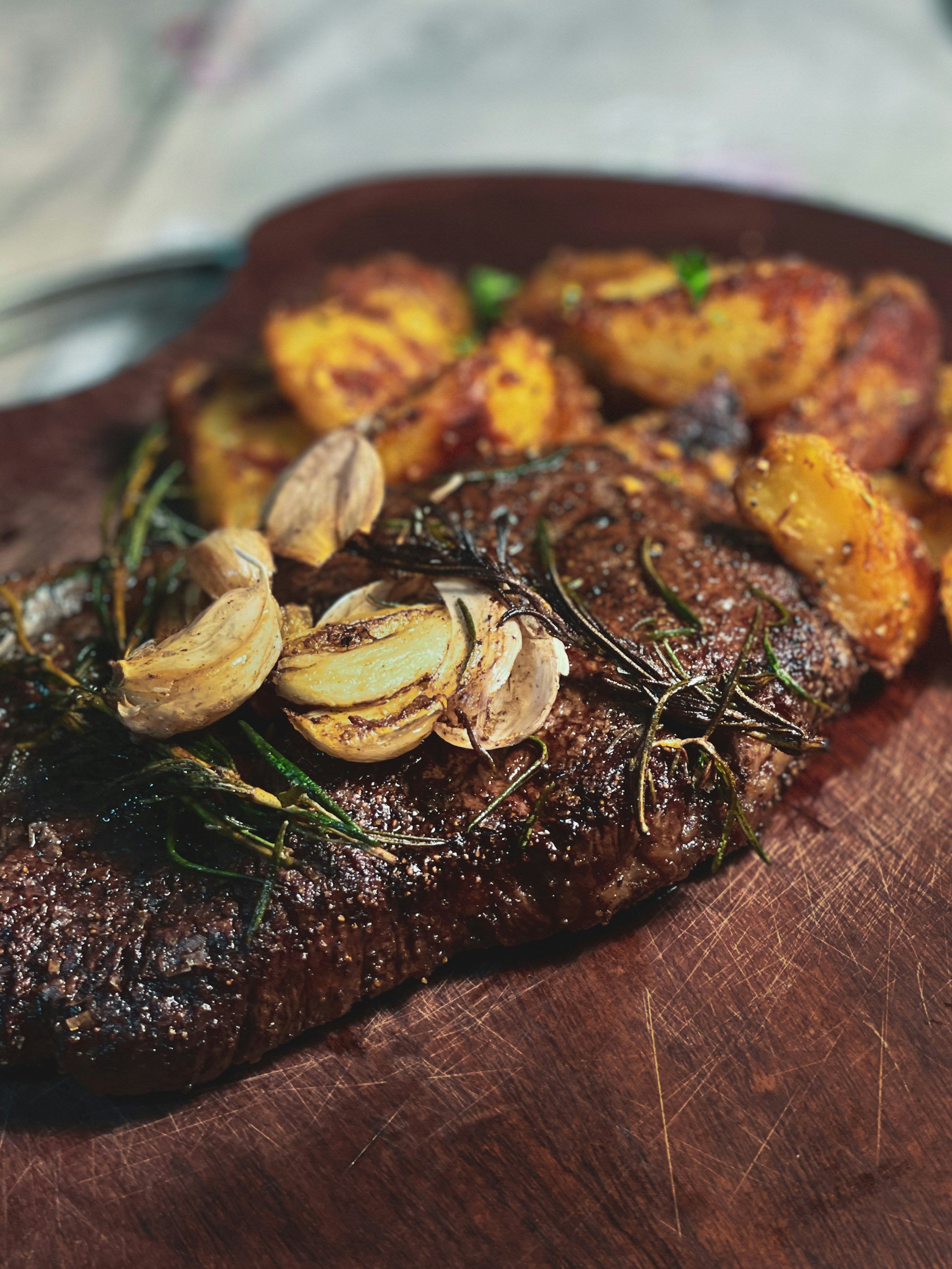 Garlic Butter Organic Rump Steak with Crispy Potatoes & Chimichurri
