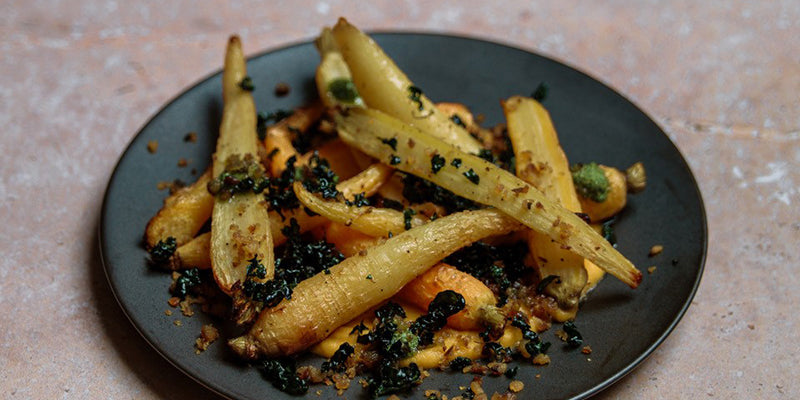Roasted Carrots squash puree walnuts and crispy kale